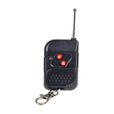 Black QTX Tetra wireless remote keyfob with red lock and unlock buttons, extended antenna and metal keyring clip, shown on a white background.