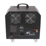 Rear view of the QTX QTFX-B4 professional bubble machine by AVSL, showing twin fan grilles, IEC power inlet, remote socket, drain tap and wheeled base.