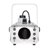 QTX 800W LED snow machine by AVSL in white metal housing, front view showing output aperture, six RGB LEDs and top-mounted 1.2-litre fluid tank.