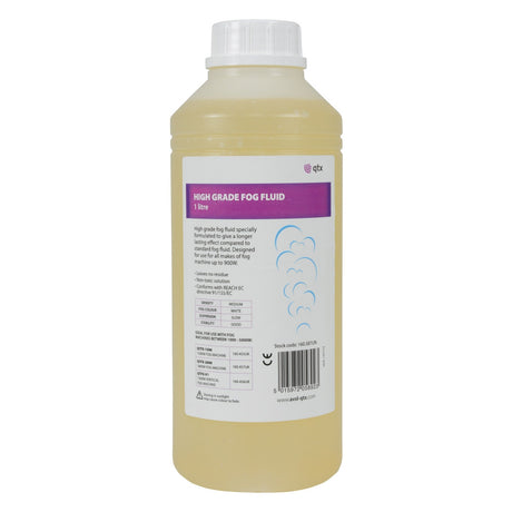 A transparent, cylindrical bottle with a white cap is labeled "QTX Fog Fluid High Grade Orange 1L." Featuring text and a cloud graphic, it emphasizes its use in fog machines. This non-toxic, water-based solution ensures safe fog generation.