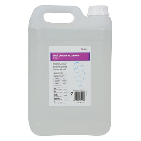 A 5-liter translucent plastic container with a handle, labeled QTX High Quality Haze Fluid for haze machines. The label is purple and white, featuring cloud graphics. This bottle of non-toxic fluid has a sealed cap and is perfect for creating atmospheric effects in laser shows.