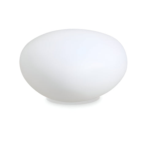 The Zest Outdoor Pedestal Light - White, 33cm, features a sleek oval design with a glossy surface that evokes the look of an abstract sculpture or large pebble. Ideal for outdoor settings, it has an IP44 rating and is strikingly showcased against a white background.