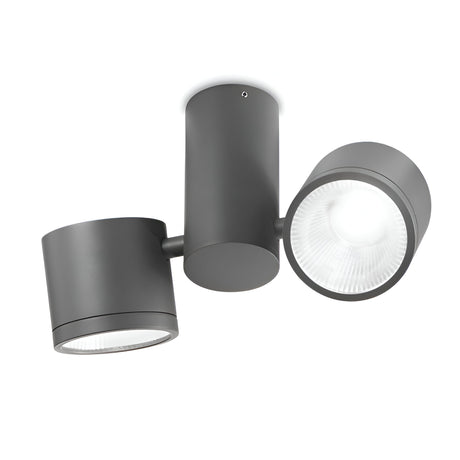 Introducing the Beamglasses LED Twin Spotlight 14.5W 4000K in Grey: a ceiling-mounted spotlight featuring a sleek, modern design ideal for outdoor lighting. The adjustable cylindrical LED lights boast a contemporary finish and are paired with white interiors. The compact base complements the style with its own matte black finish, all while maintaining an IP44 rating for durability.