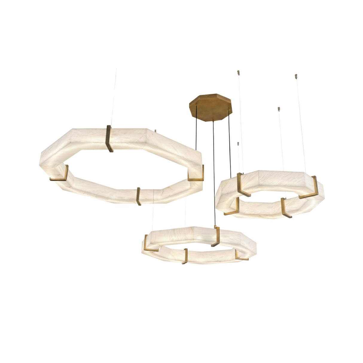 Three modern, octagonal pendant lights with frosted white shades and gold accents hang at varying heights from a central gold fixture, reminiscent of the Vireon LED Triple Ring Alabaster Suspension Light in Bronze & Soft White.