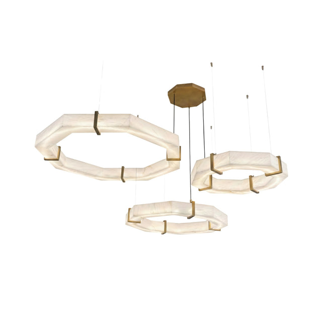 Three modern, octagonal pendant lights with frosted white shades and gold accents hang at varying heights from a central gold fixture, reminiscent of the Vireon LED Triple Ring Alabaster Suspension Light in Bronze & Soft White.