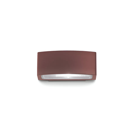The Lunar Outdoor Wall Light - Brown is a rectangular fixture featuring a clear Pyrex glass diffuser for the bulb. Its simple, modern design comes with an IP55 rating, making it ideal for exterior lighting needs.