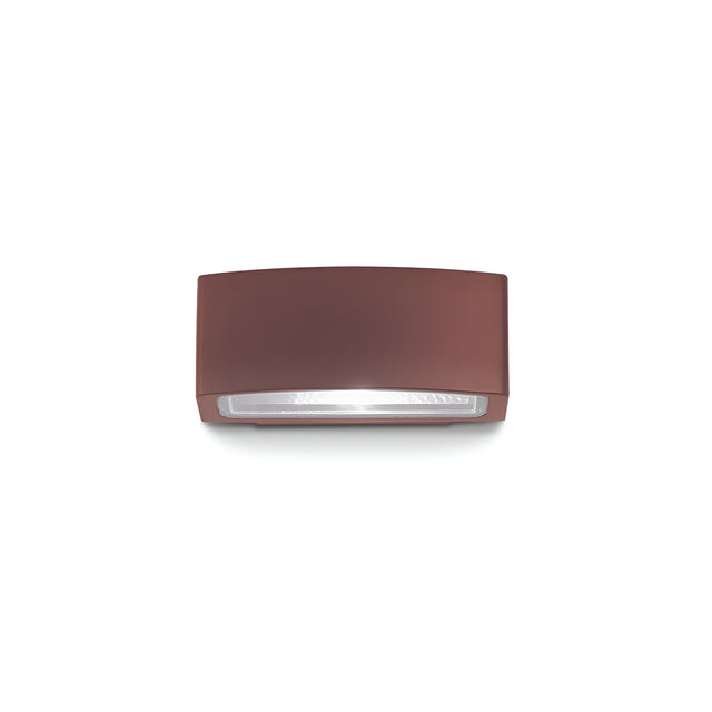 The Lunar Outdoor Wall Light - Brown is a rectangular fixture featuring a clear Pyrex glass diffuser for the bulb. Its simple, modern design comes with an IP55 rating, making it ideal for exterior lighting needs.