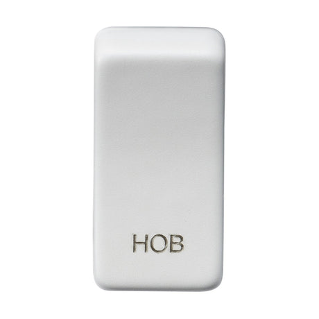 A rectangular switch cover made from white ceramic, finished in matt white with rounded edges and labeled "HOB" in gray text, set against a pristine white background.