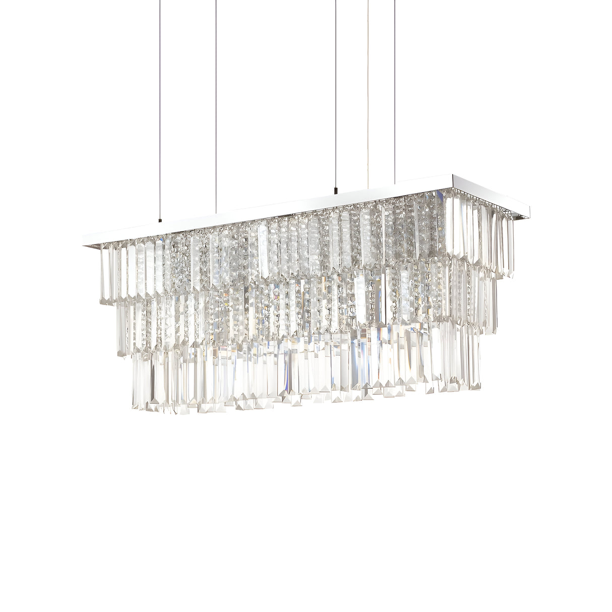 The Fluxon 6 Light Crystal Suspension - Chrome features a rectangular arrangement with three tiers of dangling glass prisms, producing a sparkling effect. Supported by three thin cables, this chrome fixture shines brilliantly against the plain white background.