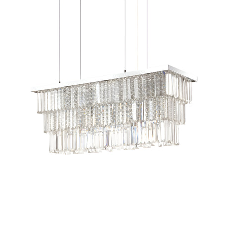 The Fluxon 6 Light Crystal Suspension - Chrome features a rectangular arrangement with three tiers of dangling glass prisms, producing a sparkling effect. Supported by three thin cables, this chrome fixture shines brilliantly against the plain white background.