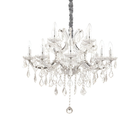 The Grove Crystal 12 Light Chandelier - Chrome, a luxurious masterpiece featuring multiple arms and candle-style bulbs, is embellished with sparkling hanging crystals. This chandelier gracefully hangs from the ceiling against a plain white background, highlighting its enchanting beauty.