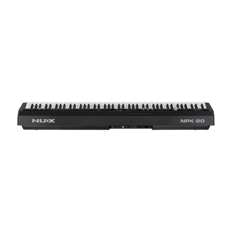Rear view of NU-X NPK-20 88-note digital stage piano in black, showing USB Type B, headphone jacks, line outputs and XLR/6.3mm mic combo input.