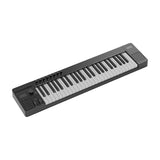 NU-X NTK-49 semi-weighted 49-key MIDI keyboard controller in black with pitch and mod wheels, sliders, rotary knobs, display and trackpad, on white.