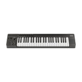 NU-X NTK-49 semi-weighted 49-key MIDI keyboard controller with sliders, rotary knobs, pitch and modulation wheels, track pad and display, on a white background.