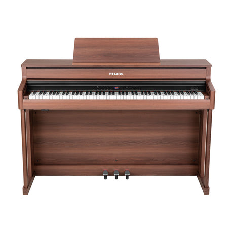 NU-X NCK-430 weighted digital piano in walnut finish with music rest, sliding key cover, triple pedal unit and 88-key hammer-action keyboard.