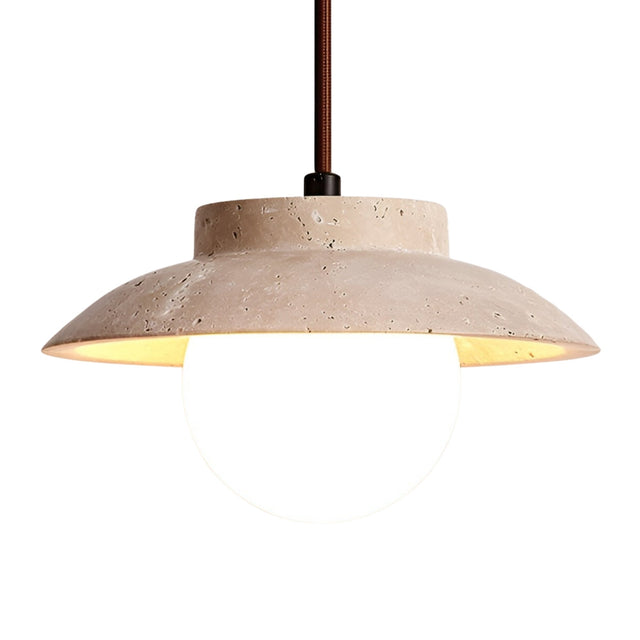 The Marcono 1 Light Layered Dome Travertine Single Pendant Light in light beige features a wide, textured concrete shade with a round white bulb, suspended from a brown cord against a white background.