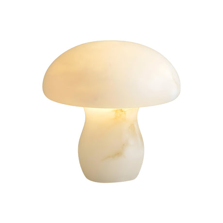 The Morfia 1 Light Small Mushroom Alabaster Table Lamp in Soft White features smooth, subtly marbled alabaster that glows warmly, its modern mushroom shape standing out against a plain white background.