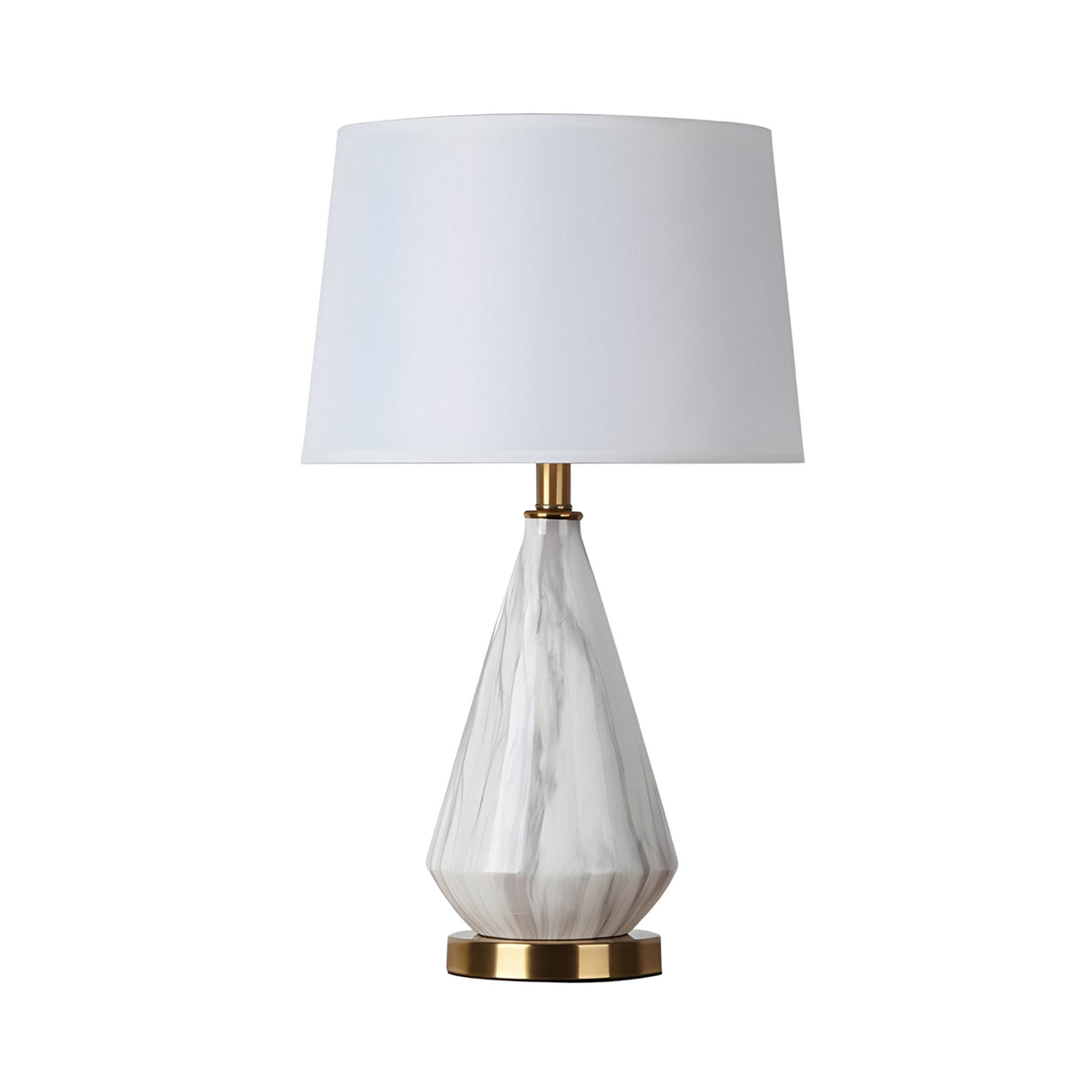 The Calvero 1 Light Diamond Facet Marble Table Lamp features a diamond-inspired white marble base, brass accents, and a large white lampshade, shown against a white background.