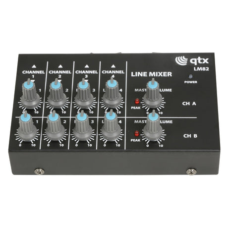 The QTX 4 Stereo Channel Line Level & Instrument Mixer, a compact audio mixer, features eight blue and gray dials for adjusting four channels and two master volumes. Equipped with high impedance jack inputs and a power indicator light, this stereo version is both versatile and efficient.