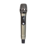 QTX J-MIC UHF handheld wireless microphone with metal mesh grille, champagne body and small display showing channel and frequency, on a white background.