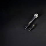 Citronic X24 wireless XLR transmitter and receiver plugged into a handheld dynamic microphone on a black background.