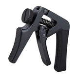 Cherub CGC-1 Gemini Adjustable Guitar Capo in matte black with knurled tension wheel, spring mechanism, and textured grip, shown on a white background.