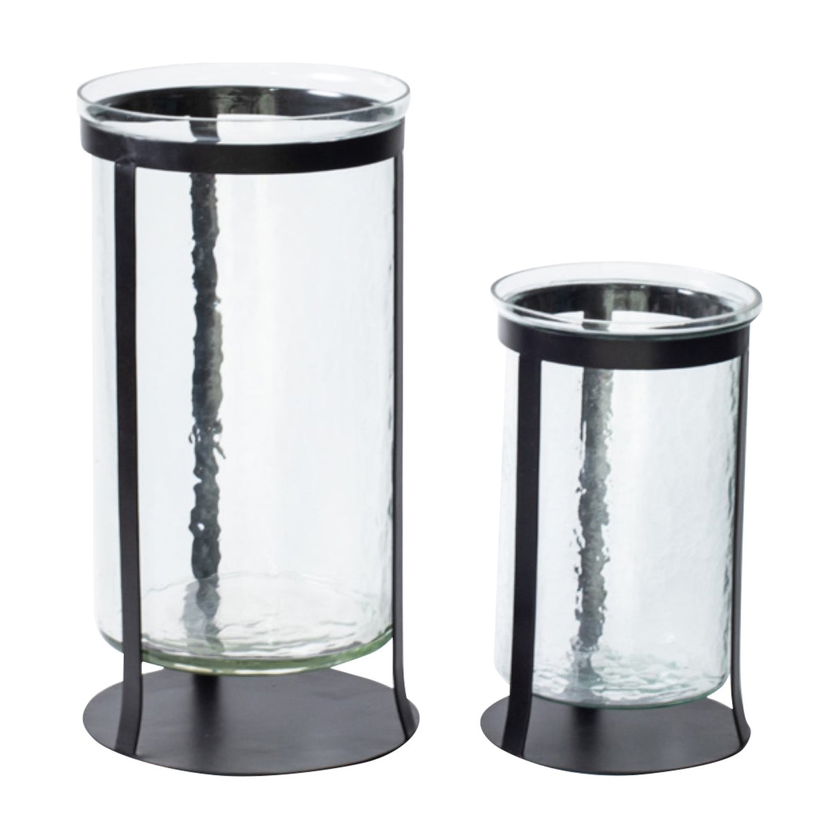 Libra Interiors Hammered Glass Black Iron Hurricane Lanterns shown in two sizes, with clear cylinders set in slim black iron frames on round bases.
