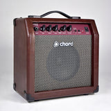 Chord CA-15BT 15W acoustic guitar amp in brown vinyl with basket weave grille, top-mounted EQ and chorus controls, and carry handle on a light background.