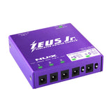 NU-X NIP-Z6 Zeus Jr. isolated pedal power supply in purple, with six DC output jacks, indicator LEDs, and selectable 9/12/18V settings.