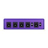 NU-X NIP-Z6 Zeus Jr. isolated pedal power supply in purple, side view showing five DC output jacks and a voltage selector switch.
