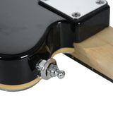 Close-up of a Chord SL2-C chrome strap lock fitted to the edge of a black electric guitar body, showing the spring-loaded pin and washer.
