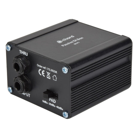 The Chord Passive Direct Injection Box is a black DI box that features numerous input/output connectors and a pad switch with options for 0dBu, -20dBu, and -40dBu. Its surface includes various text and symbols, such as CE and UK certifications, along with a ground lift function to reduce noise.