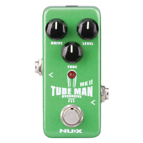 A Tube Man Mkii Overdrive Pedal by NU-X, designed in green, features three black knobs for adjusting drive, level, and tone. It delivers an authentic tube sound that echoes the classic Tube Screamer pedal. The effects pedal includes input and output jacks on the sides and a footswitch at the bottom for easy control.