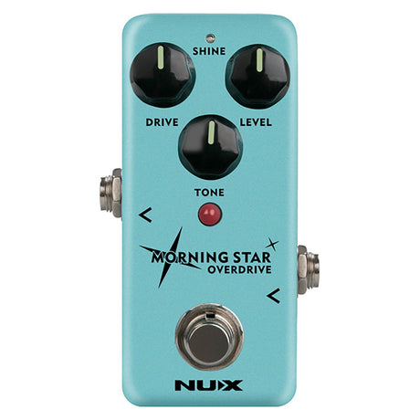 The NU-X Morning Star Overdrive Pedal, in a striking turquoise color, is inspired by classic blues drive pedals and boasts three black knobs labeled Shine, Drive, and Level. It also includes a centrally positioned Tone knob and a footswitch to round out its design. The brand name NUX is prominently displayed on the pedal. The flexible Shine mode enhances the sound with an added layer of brilliance.