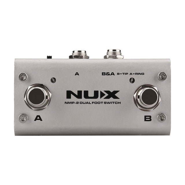 NU-X NMP-2 Dual Foot Controller Switch Pedal in a compact silver metal housing with A and B footswitches, LED indicators and top-mounted jack sockets.