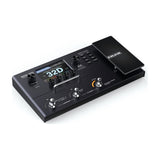 NU-X MG-30 multi-effects modeller pedal in matte black with colour LCD, rotary encoders, expression pedal and three footswitches for looper, drum and tuner.