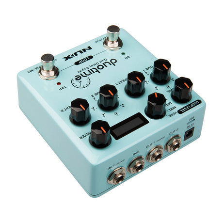 NU-X NDD-6 Duo Time dual engine delay pedal in light blue, angled view showing eight black knobs, two footswitches, OLED display, jack inputs and outputs.