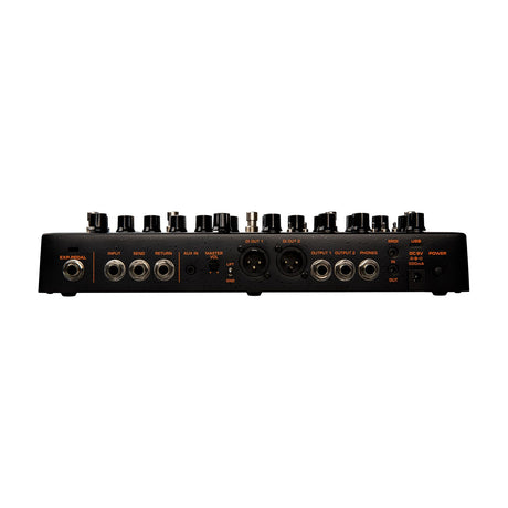Rear panel of the NU-X NME-5 Trident amp modeller pedal showing expression, input, send, return, aux, XLR DI outs, 6.3mm outputs, MIDI, USB and DC power.