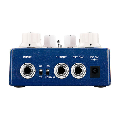 Rear panel of the NU-X NDO-6 Queen of Tone dual overdrive pedal in blue sparkle finish, showing input, output, EXT.SW, DC 9V jacks and toggle switches.