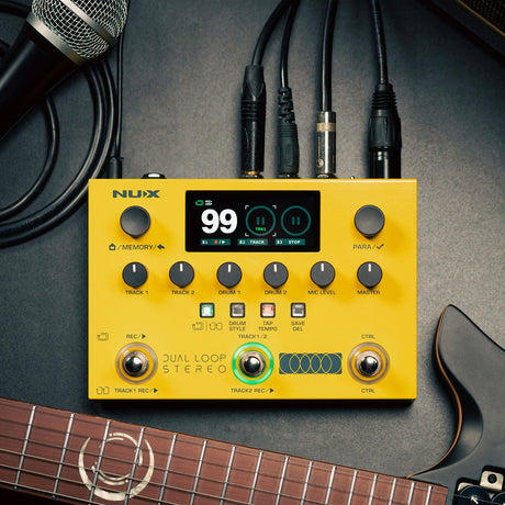 NU-X NML-3DLS Dual Loop Stereo Looper Pedal in yellow with colour LCD, control knobs and three footswitches, shown with microphone, cables and guitar.