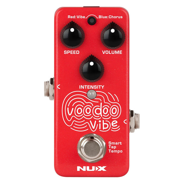 The NU-X Voodoo Vibe Mini Pedal is a red effects pedal featuring three black knobs for Speed, Volume, and Intensity. This compact unit includes a footswitch and Smart Tap Tempo function, offering rotating speaker effects highlighted by a wavy white design in the center.