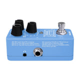 Side view of NU-X NDL-3 Hook Drum Machine & Looper Pedal in blue, showing knobs, footswitch, headphone minijack and 6.35mm output on a white background.