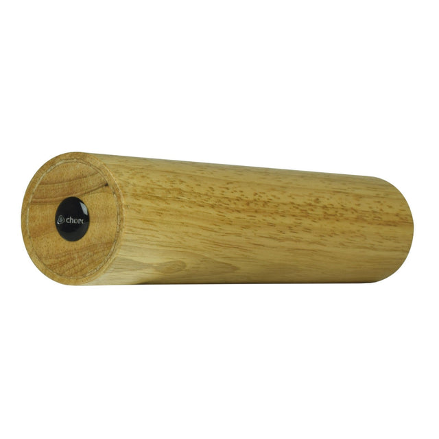 Introducing the Chord Rubberwood Tube Shaker: a sleek, cylindrical musical tool crafted from smooth-finished rubberwood. The end facing you displays a black button embellished with a distinctive logo, while the visible wood grain highlights its natural texture and color, ideal for adding rhythmic percussion effects.