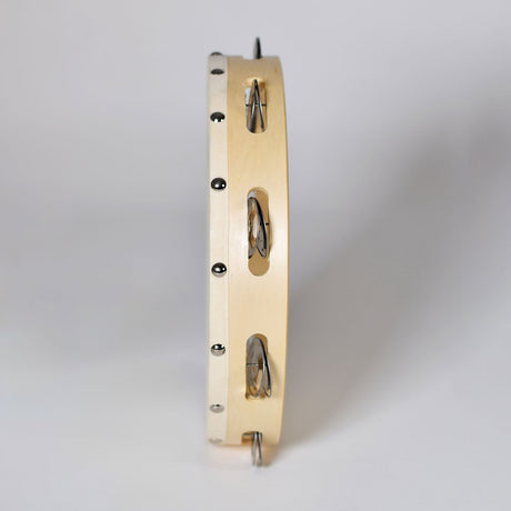Side view of the Chord TAMB10H 25cm headed tambourine by AVSL, showing the natural wooden ring with paired metal jingles, on a plain background.