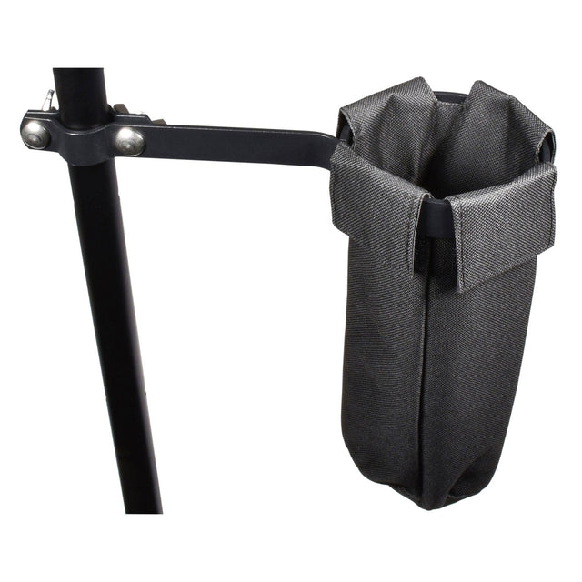 The Chord Drum Stick Holder features a black bracket, similar to a drum hardware clamp, that secures to a vertical pole and holds a gray fabric bag. The cylindrical bag is open at the top, making it ideal for storing small items or drumsticks. Bolts ensure the bracket stays firmly in place, while the textured fabric enhances the practicality and character of this accessory.