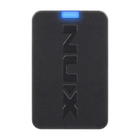 NU-X NBT-1 Bluetooth Audio and MIDI Adapter by AVSL, a compact matte black USB-C dongle with embossed NUX logo and glowing blue LED indicator.