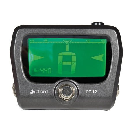 Chord PT-12 chromatic pedal tuner in a grey casing with large green backlit LCD showing note A at 440Hz, metal footswitch, and side jack sockets.
