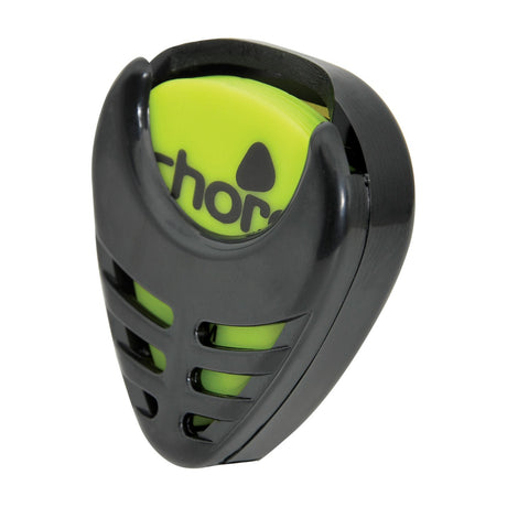 Chord PH-B self-adhesive pick holder in black plastic with slotted grip and spring-loaded retainer, holding a green guitar pick, shown on a white background.