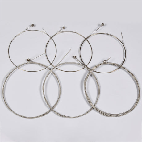 Chord EG942 nickel wound electric guitar strings, six coiled loose strings with ball ends, 9-42 gauge set on a plain white background.