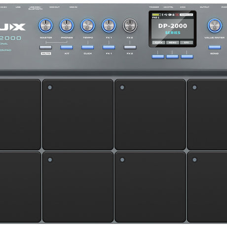 NU-X DP-2000 digital percussion pad by AVSL, close-up of control panel with rotary knobs, blue-lit buttons, LCD display, and eight black touch-sensitive pads.